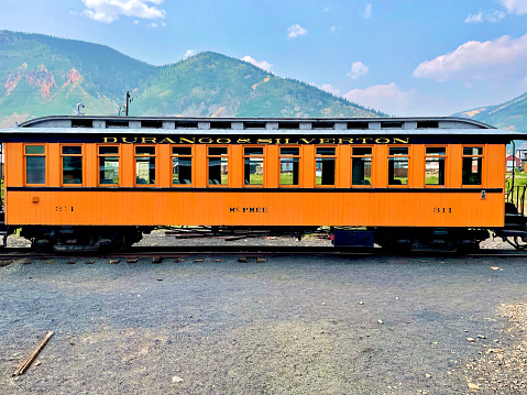 Silverton, Colorado, USA - July 12, 2021: A Durango & Silverton Railroad Passenger Car sits empty in historic Silverton.