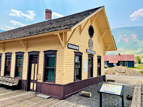 Silverton, Colorado, USA - July 12, 2021: The historic Durango & Silverton Narrow Gauge Railway Passenger Station is a destination for tourists in Silverton.