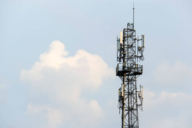 istock Telephone pole so high blue sky with clouds background. 1415700063