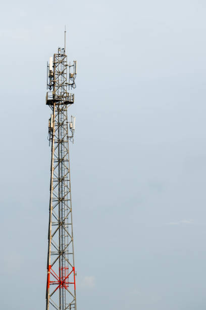 istock Telephone pole so high blue sky background. 1415700064