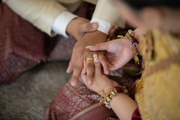 istock wear a ring, wedding ring, love couple 1415700190