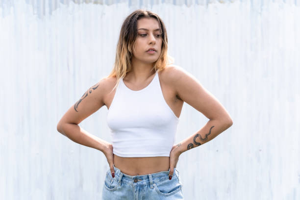 istock Stylish woman hands on hips. 1415700431