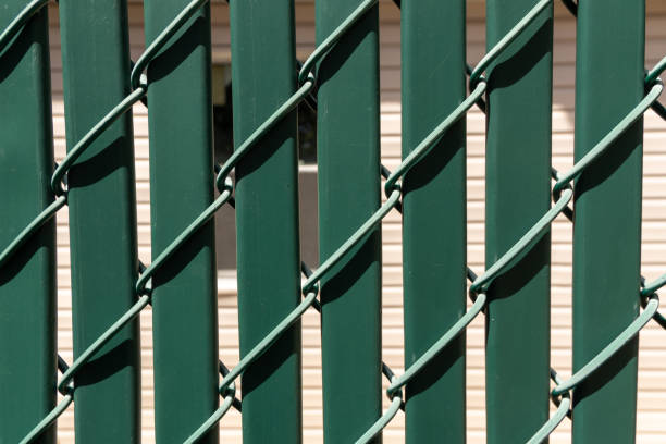 istock Green fence background 1415702416