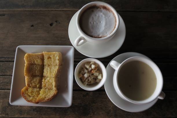 istock Breakfast for this morning, coffee, soup, bread 1415704333
