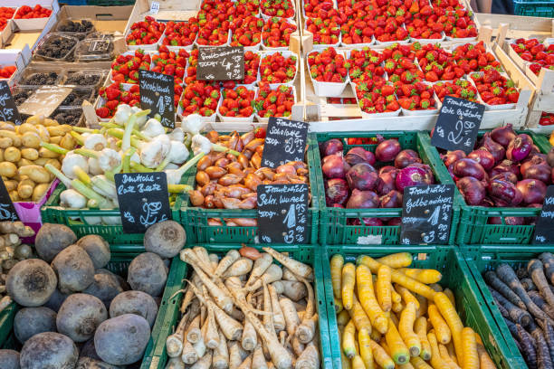 istock Vegetables and strawberries for sale 1415709203