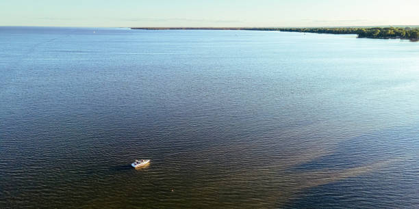 istock Lone boat on lake winnebago in summer 1415711433