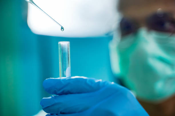 istock A team of biochemical research scientists work with in vitro to develop vaccines and anti-coronavirus drugs in drug research laboratories. focus, education concept 1415713842