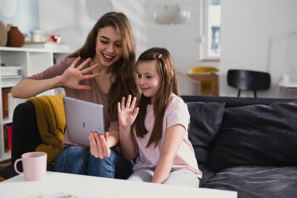istock mother and daughter at home 1415717073