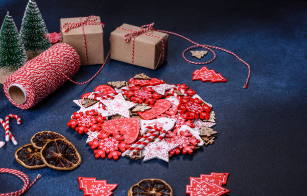istock Christmas homemade gingerbread cookies on dark concrete table 1415720923