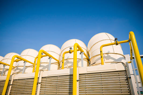 Sets of cooling towers in conditioning systems Sets of cooling towers in conditioning systems at office building , cooling rack photos stock pictures, royalty-free photos & images