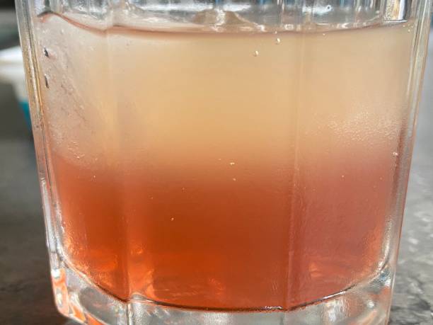 istock Drink with two colors and phases 1415727091