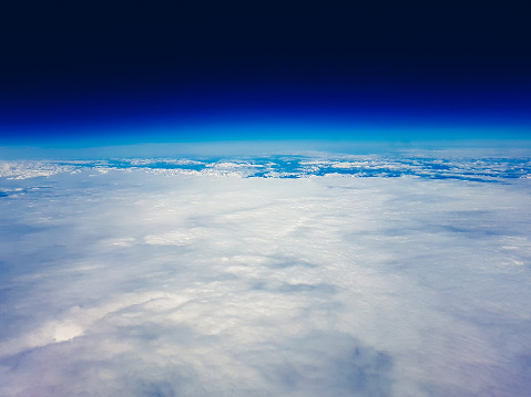 Flying over a cloud sky, a view from low Earth orbit