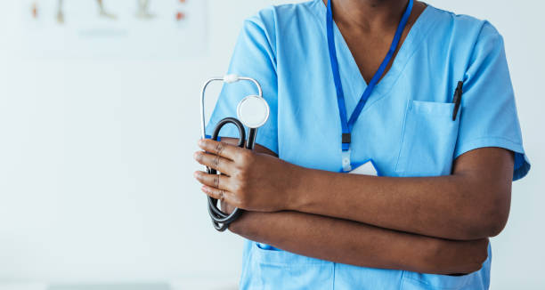 istock Unrecognizable female doctor holding s stethoscope 1415733483