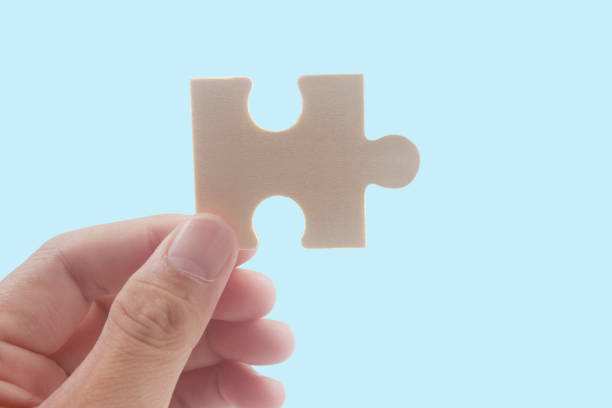 istock Connecting jigsaw puzzle. Business solutions success 1415735188
