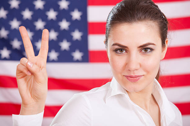 victory sign over american flag