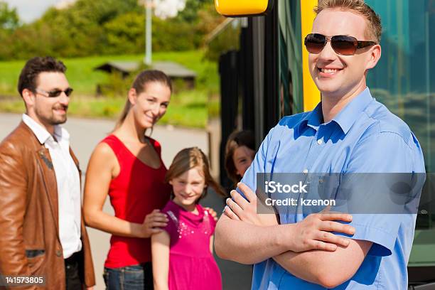 Passengers Boarding A Bus Stock Photo - Download Image Now - Bus Station, Service, Adult