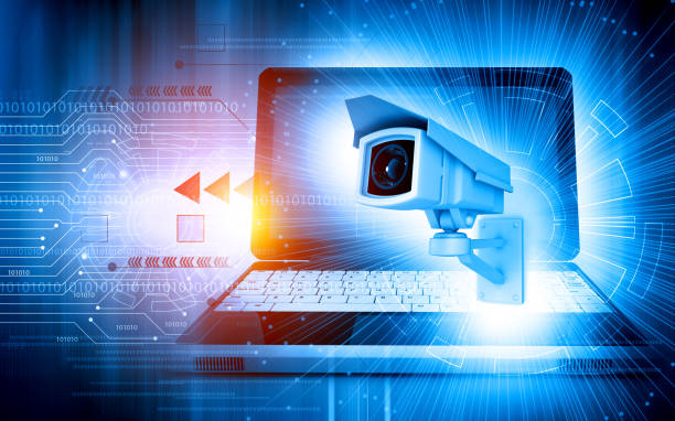 istock Modern CCTV camera, surveillance and monitoring security camera  with laptop 1415738843