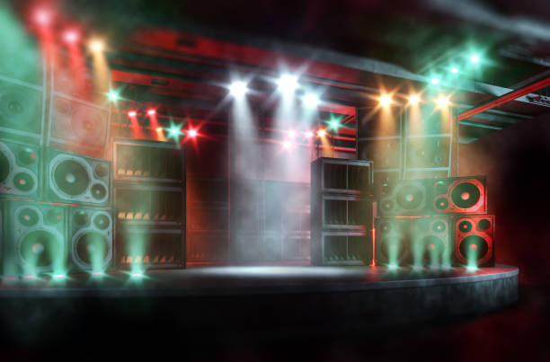 istock Music concert background with empty stage illuminated by spotlights 1415745786