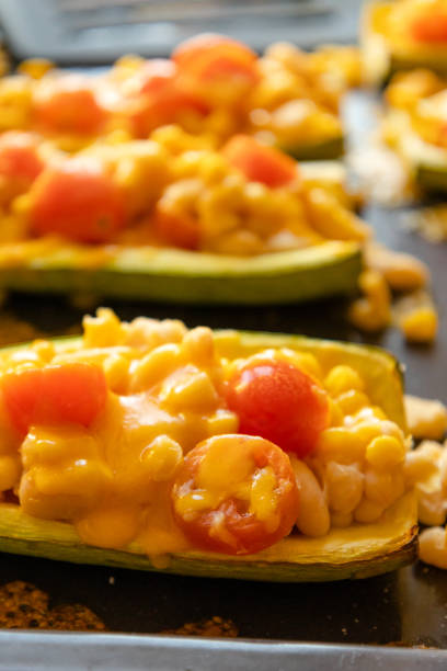 istock mediterranean food stuff zucchini with corn beans and cherry tomatoes with cheder cheese 1415752744