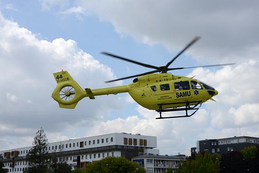 Vannes, France, August 18, 2022 : Samu des Pays de la Loire helicopter taking off from the heliport of the Bretagne Atlantique hospital center in Vannes