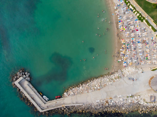 istock Aerial View Of People Crowd Relaxing On Beach 1415755487