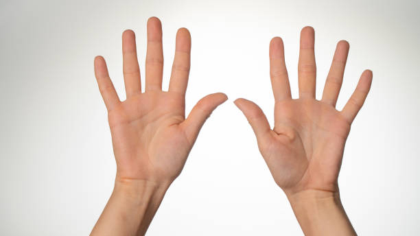 istock Women's hands gesture counting on fingers ten palm side 1415757327