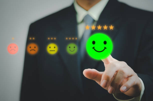 istock Man hand touch virtual screen emotion service and customer review feedback rating good and best five stars. 1415757954