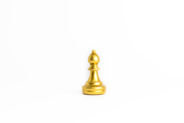 istock chess game gold isolated on white background. 1415758052
