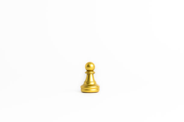 istock chess game gold isolated on white background. 1415758053