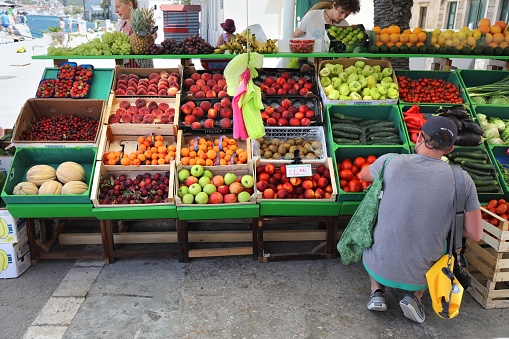 Local fruit and vegetable stand in the old town of Vis. Croatia had 18.4 million tourist visitors in 2018.