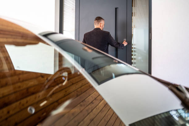 istock Man's finger pressing on fingerprint scanner to enter his house 1415760881