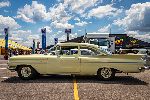 Lebanon, TN - May 13, 2022: Wide angle low perspective side view of a 1959 Chevrolet BelAir 2 Door Sedan at a local car show.