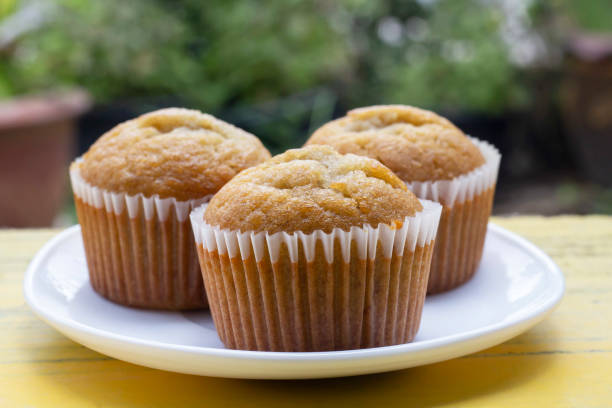 istock Sweet Banana muffins in white plate on the table. 1415764483