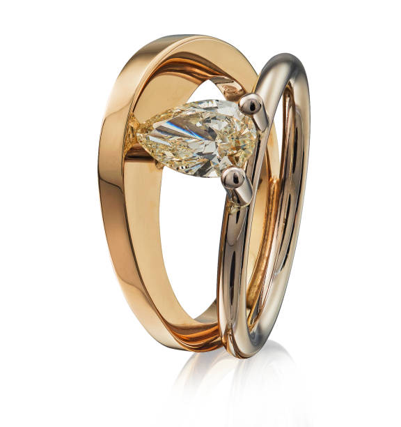 istock Golden ring with gemstone isolated on white background 1415774637