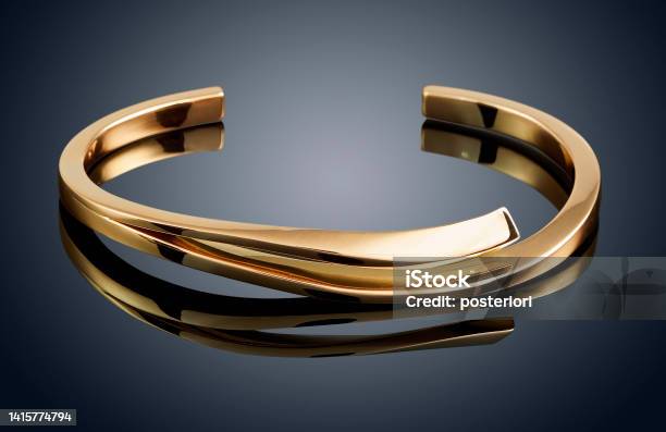 Golden Bracelet Isolated On Grey Background Stock Photo - Download Image Now - Bracelet, Luxury, Gold - Metal