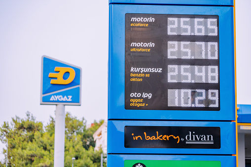 10 July 2022, Antalya, Turkey: inflation and expensive prices for petroleum products. Motorists fill their cars with gasoline and diesel at the Turkish Opet Aygaz gas station.
