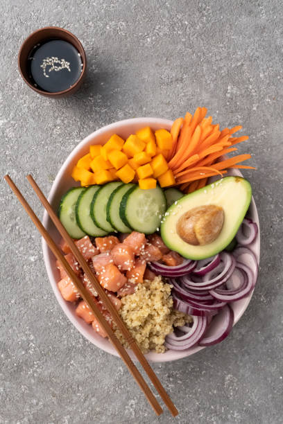 istock Poke bowl Quinoa with salmon and vegetables 1415776759