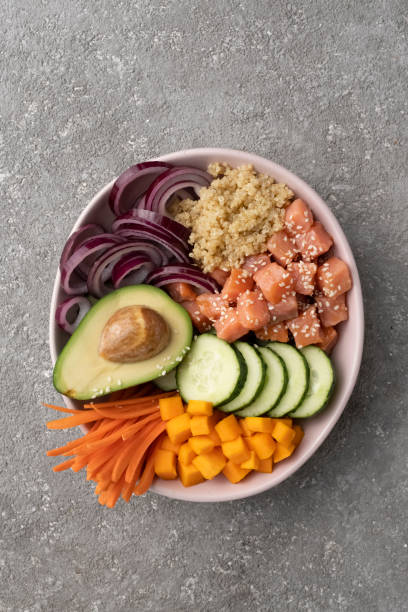 istock Poke bowl Quinoa with salmon and vegetables 1415778070