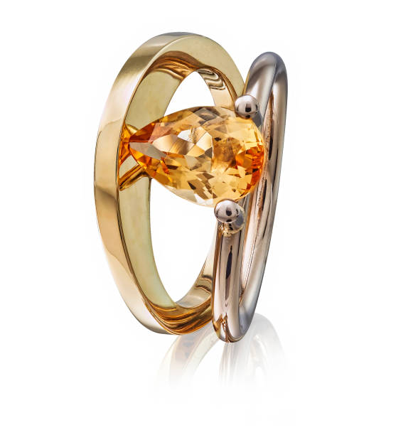 istock Golden ring with gemstone isolated on white background 1415778167