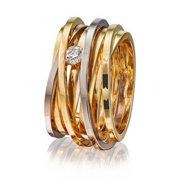 istock Golden ring with gemstone isolated on white background 1415778225