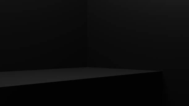 istock black minimalist empty desk, blank stage, 3d pedestal for display, showcase, and advertising. 1415780083