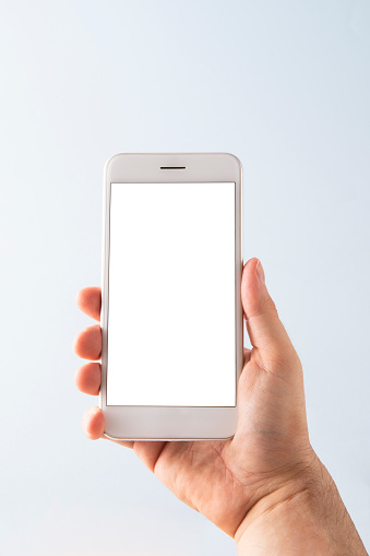 White mobile phone display in front of a blue background