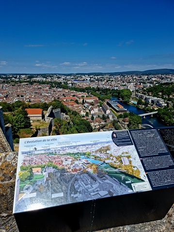 The Citadel of Besançon (French: Citadelle de Besançon) is a 17th-century fortress in Franche-Comté.  The image shows a wall of the Citadel captured during summer season with a city map.