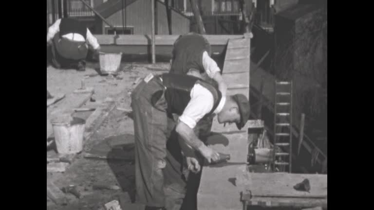 United Kingdom 1939, Men, workers work in construction site in 30s