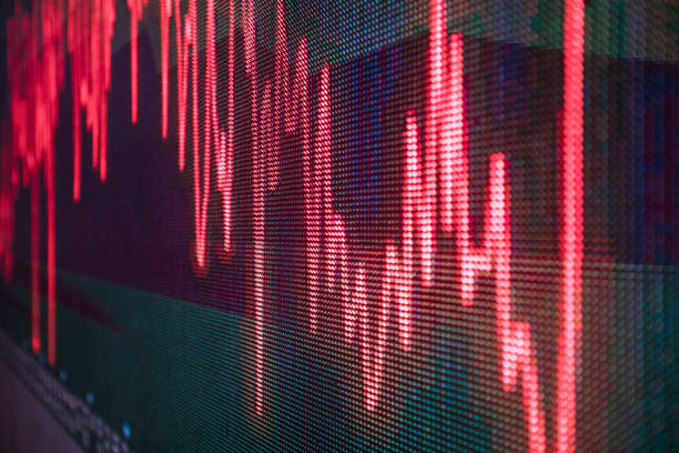 istock stock chart trend red line in big LED screen 1415793497