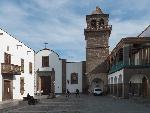 Las Palmas de Gran Canaria, Canary Islands, Spain December 23, 2020: Square Plaza de San Agustin at old town Vegueta with historic palace Palacio de Justicia and church Parroquia San Augustin