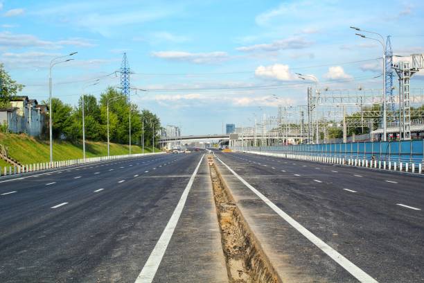 istock New traffic intersection road construction site. Development of transport infrastructure junction, improvement highway 1415796879