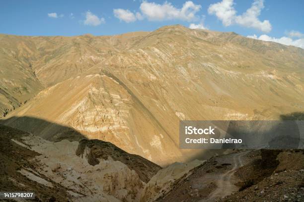 Spiti Valley With High Ridges And Steep Slopes Of Himalayas Under Blue Sky Near Kaza India Stock Photo - Download Image Now