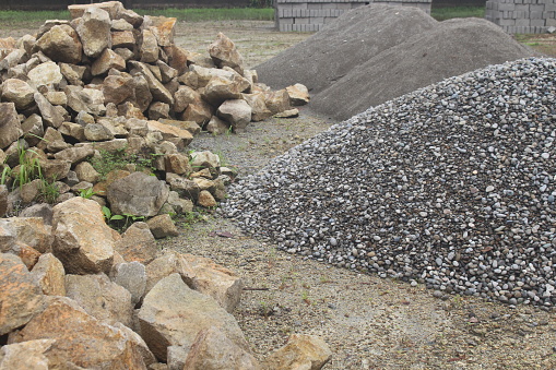 boulders, gravel and sand ready to be used for building construction