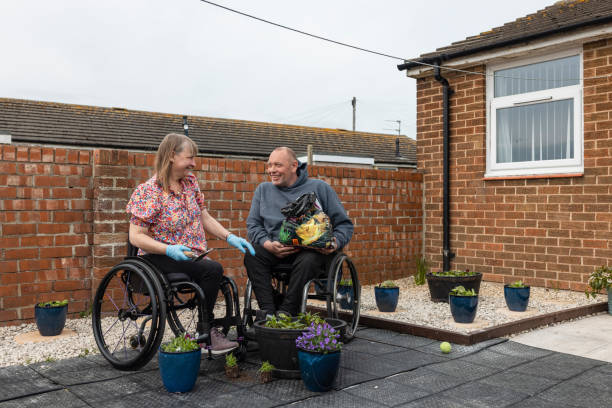 istock Planting Flowers Together 1415804172